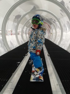 Kid Snowboarding - Travelator
